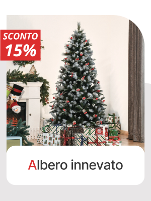 Albero innevato con bacche