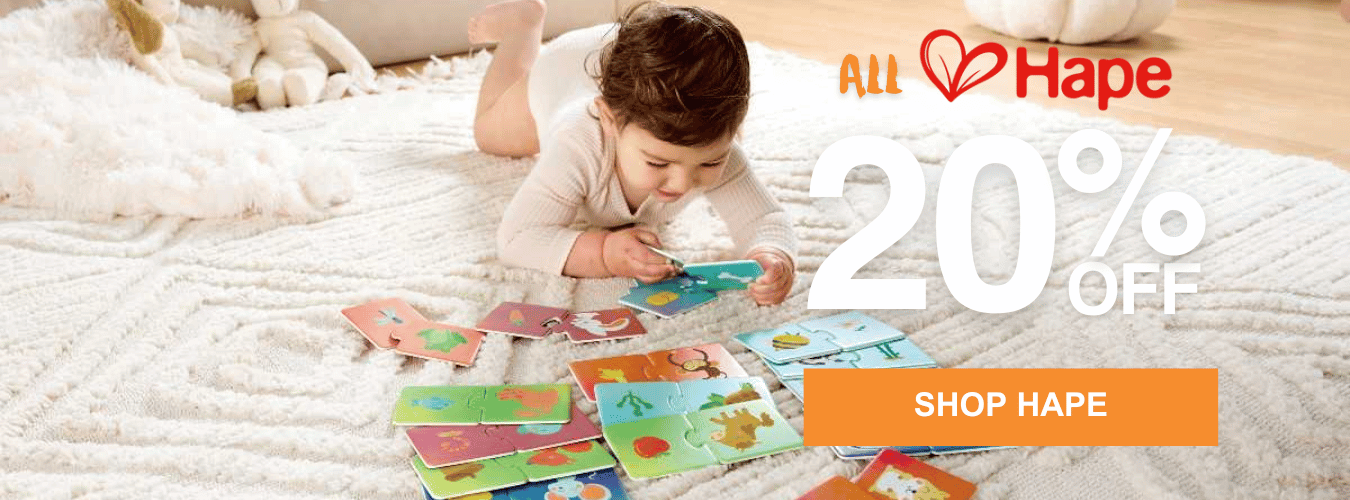 Child playing with Puzzles. Shop 20% off all Hape
