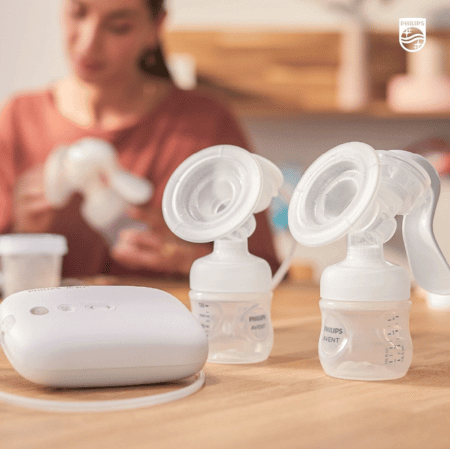 Mother cleaning Avent Breast pumps