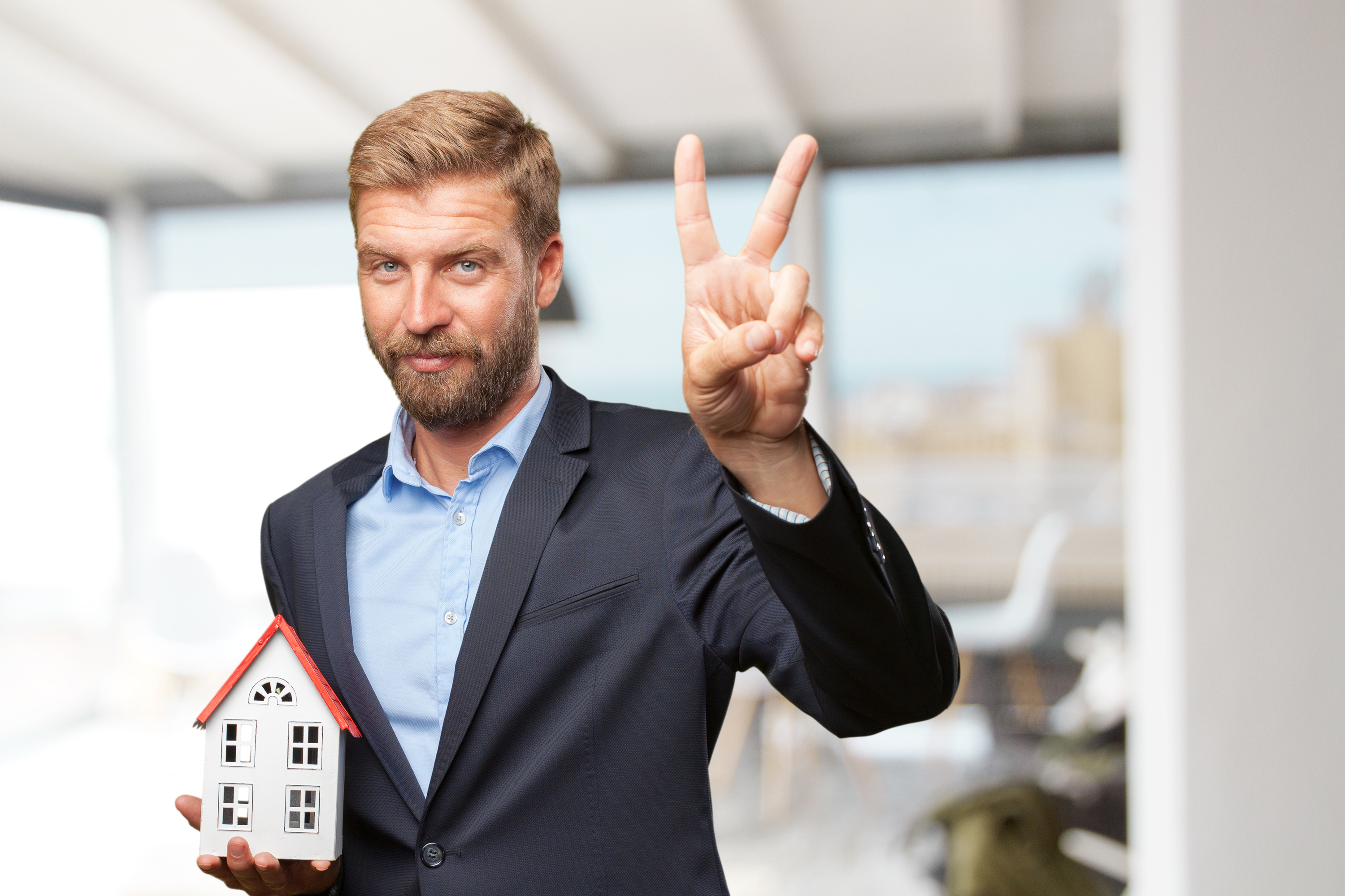 blond-businessman-happy-expression