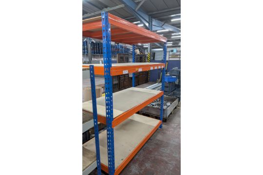 Freestanding bay of blue and orange racking with four…