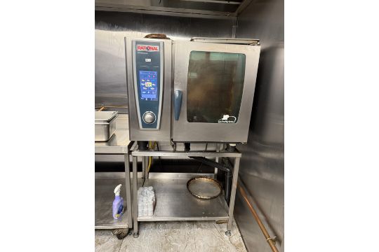 A Rational SCC WE 61G gas combi oven on stainless steel…