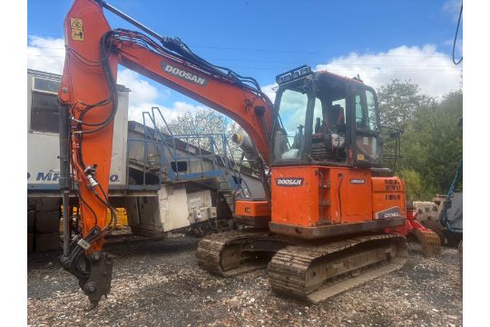 Doosan DX140LC-5 crawler excavator with raised cab…