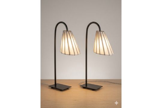 A pair of Caravane Paris 'Ella' Table Lamp is an elegant…