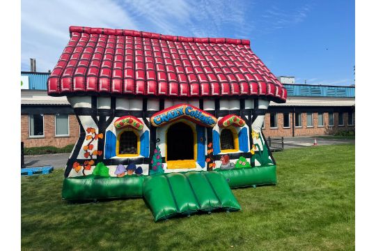Jumbo Inflatables crazy cottage bouncy castle…