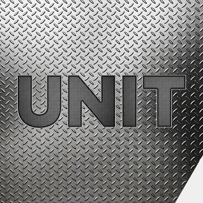 The UNIT logo on a metal plate
