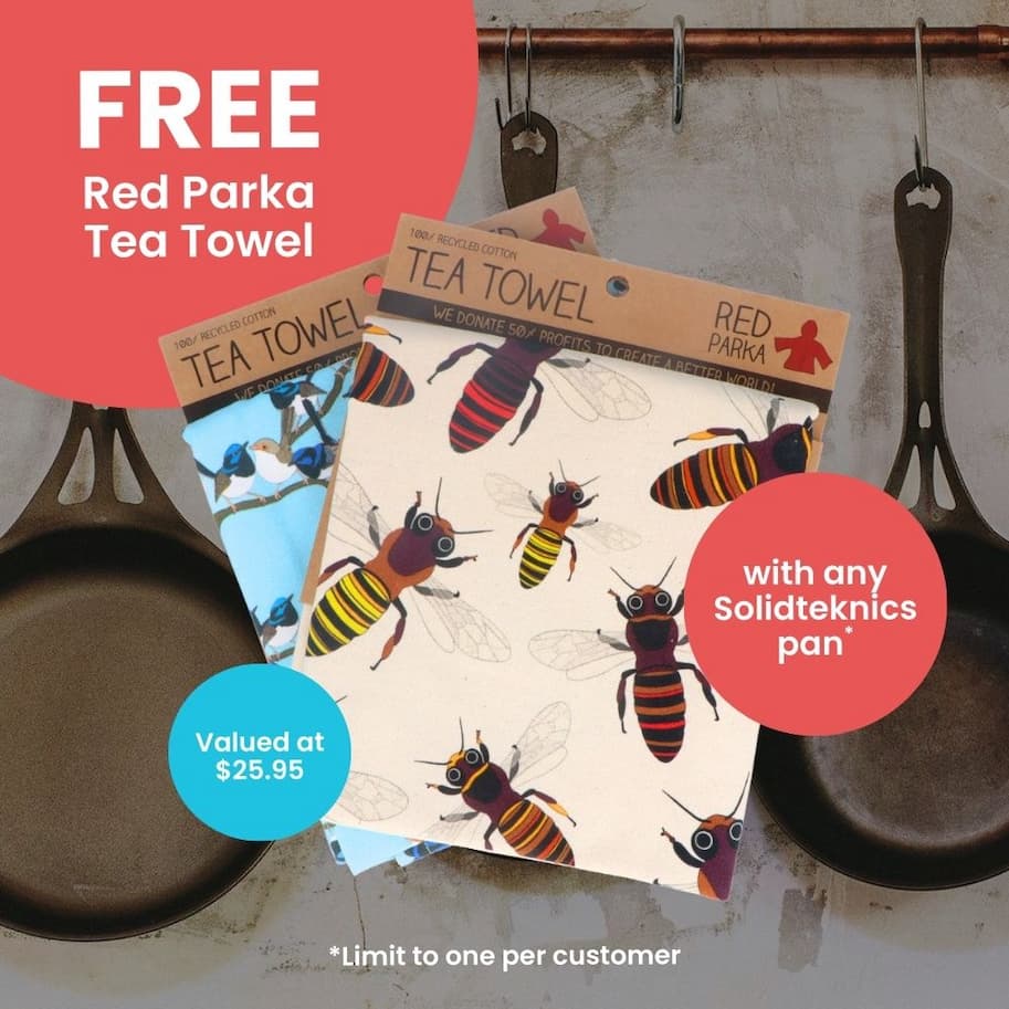 Red Parka tea towel gift with a Solidteknics pan purchase