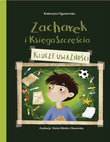 Children's book cover, dark green, illustrated boy amid school items and doodles; Polish title 'Zacharek i Księga Szczęścia: Klucze Uważności'