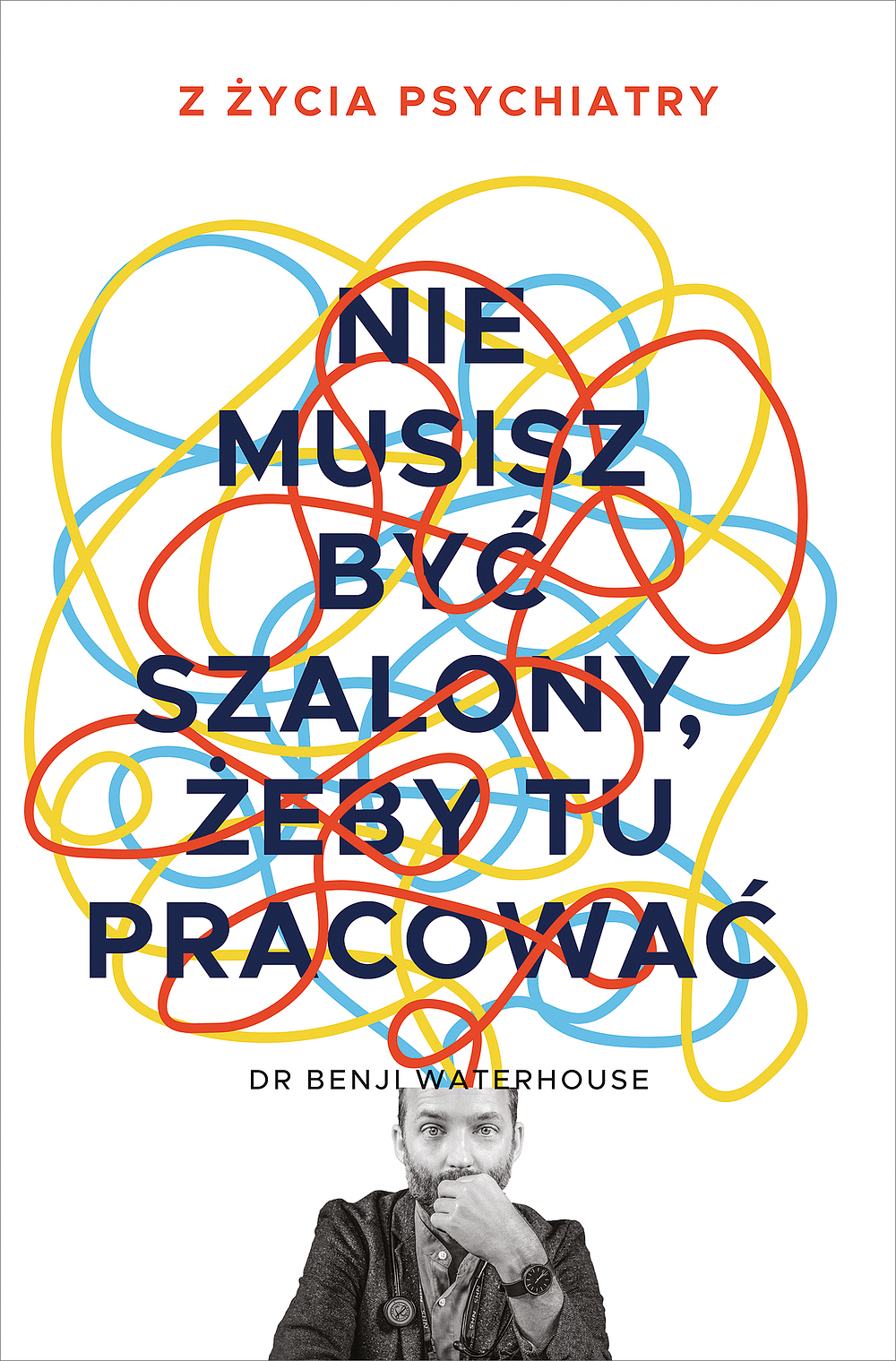 Book cover with Polish title 'Nie musisz być szalony, żeby tu pracować', colourful scribbles and male portrait