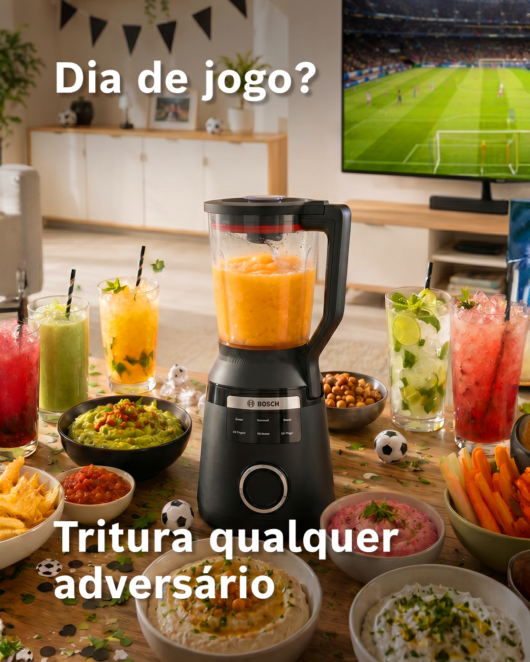 Liquidificador Bosch, petiscos e bebidas. Jogo de futebol na TV.