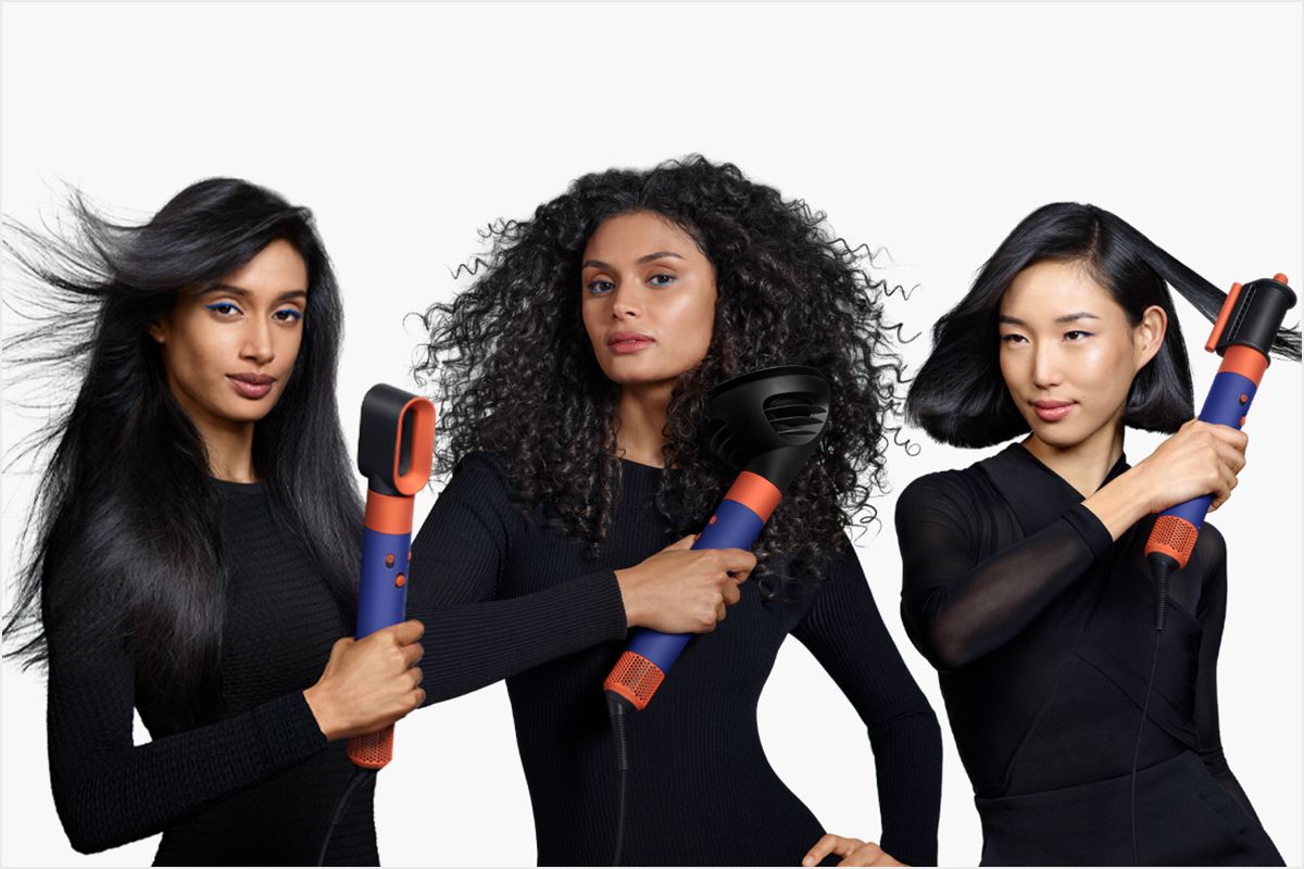 Three models using the Dyson Airwrap i.d. multi-styler and dryer 