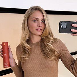 A range of models with different hair types nourished using Dyson Omega products.