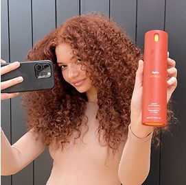 A range of models with different hair types nourished using Dyson Omega products.