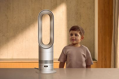 The Dyson Hot+Cool HF1 Remote Link Pre-heat heater and cooling fan next to a small child.