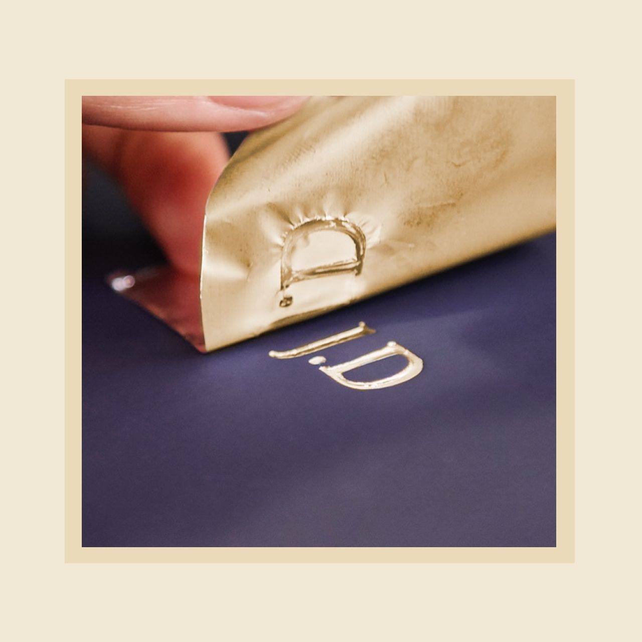 Initials are debossed into a Dyson presentation case.