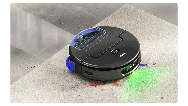 El robot aspirador y fregona Dyson Spot+Scrub Ai sale de su base de carga.