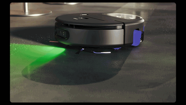 El robot aspirador y fregona Dyson Spot+Scrub Ai limpia el suelo.