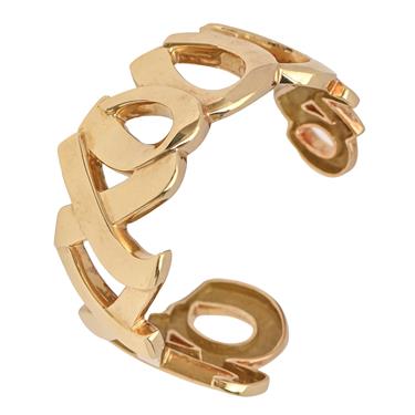 Tiffany & Co. An 18ct Gold X 'Kiss' Bangle, Designed by Paloma Picasso