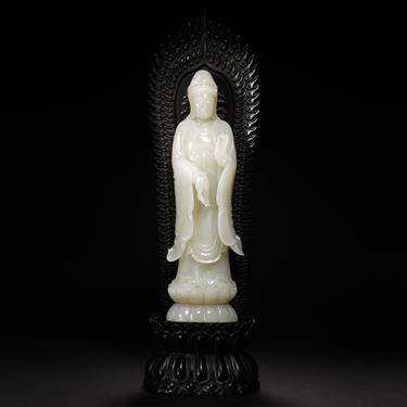 A White Jade Standing Figure of Shakyamuni, Qing Dynasty