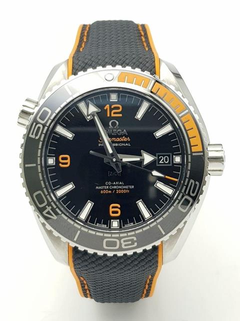 A Sublime Omega Seamaster Planet Ocean 600M. Orange and black rubber strap/ Stainless steel case