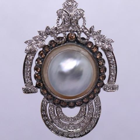 18ct White Gold Pendant Centrally Set With a Mabe Pearl Surrounded by Champagne Diamonds & Bordered by Many White Diamonds