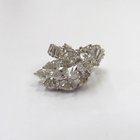 A Diamond Cluster Ring, Set With a Sweep of 11 Pear Cut Diamonds Flanked by Baguette Cut Diamond Set Shoulders