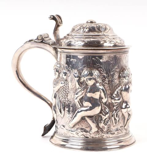 A Large George I Silver Lidded Tankard With Embossed Bacchanalian Figures In A Procession