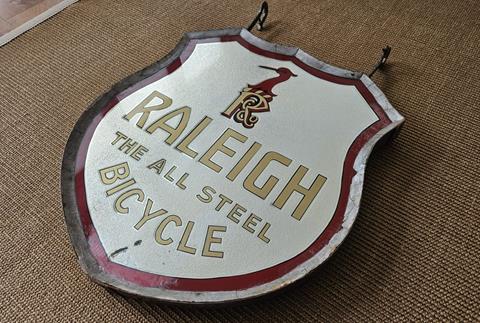 Raleigh Glass Advertising Sign