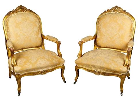 A pair of French giltwood fauteuils, of Louis XV style