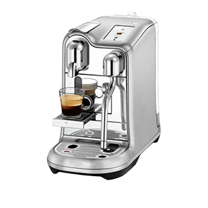 Silver espresso machine with two cups.