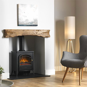 Cozy living room with stove and armchair.