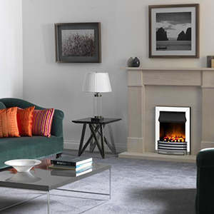 Modern living room with fireplace and green sofa.