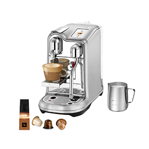 Silver espresso machine with coffee pods.