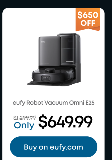 Woman wearing an olive green blazer and light blue jeans walking in an urban setting.