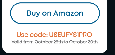 Woman wearing an olive green blazer and light blue jeans walking in an urban setting.