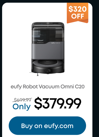 Woman wearing an olive green blazer and light blue jeans walking in an urban setting.