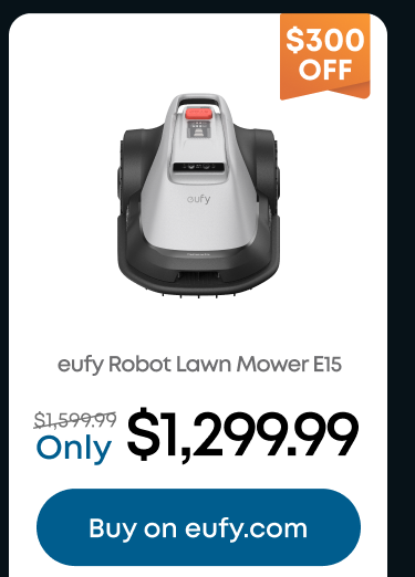 Woman wearing an olive green blazer and light blue jeans walking in an urban setting.