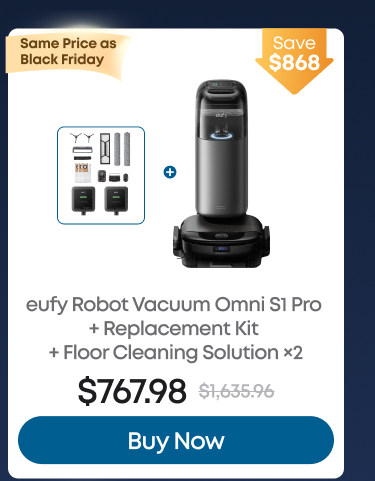 Woman wearing an olive green blazer and light blue jeans walking in an urban setting.