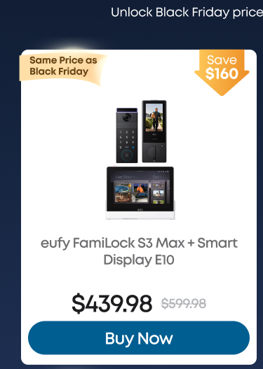 Man in a gray blazer over a dark gray shirt standing on stairs in an urban background.