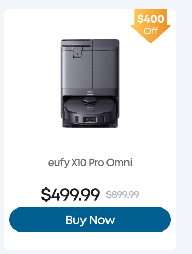 Woman wearing an olive green blazer and light blue jeans walking in an urban setting.