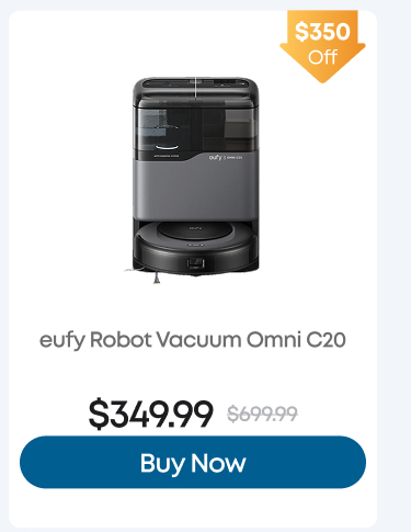 Woman wearing an olive green blazer and light blue jeans walking in an urban setting.