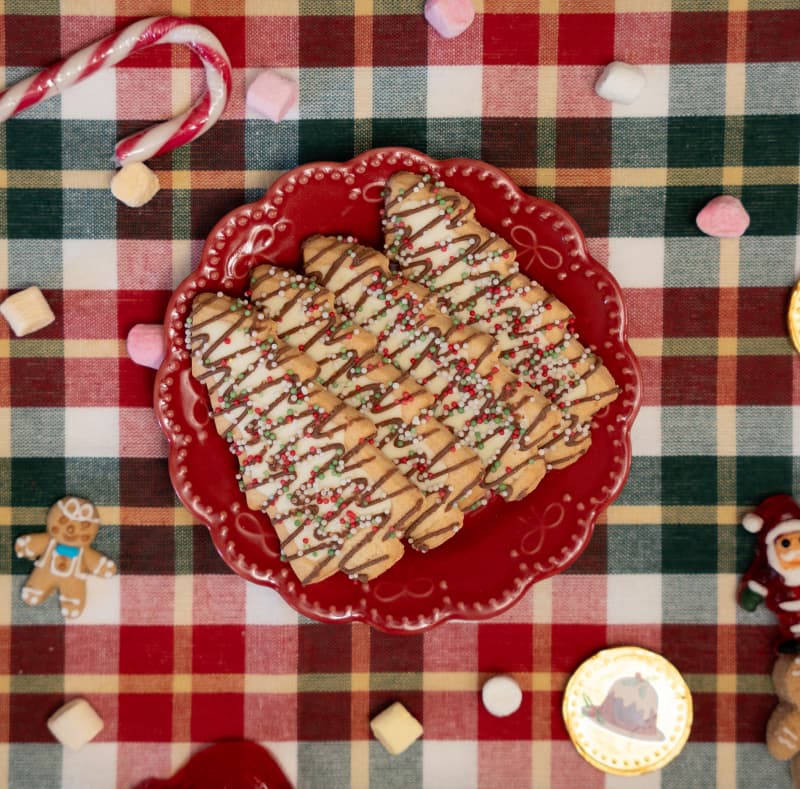 Christmas tree cookies with white chocolate and sprinkles
