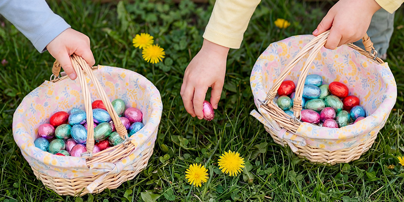 Blue milk chocolate eggs in net with popping candy