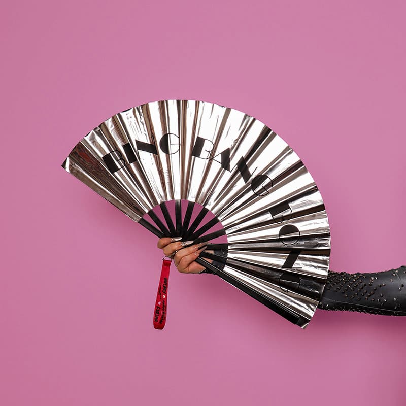 Silver clack fan with strap