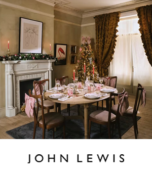 John Lewis - Festive décor in dining area with tree and fireplace