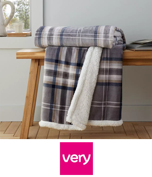 Very - Fluffy blanket on tabletop