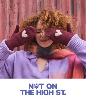 NOTHS - Lady with heart-patterned gloves covering face