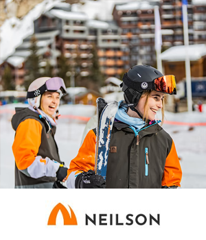 Neilson: Kids in skiing gear beside ski village
