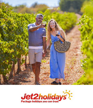 Jet2Holidays - Couple walking through an olive field