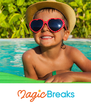 Magic Breaks: Child in the pool with heart-shaped sunglasses